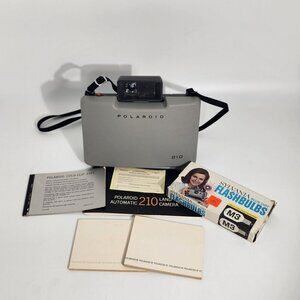 Polaroid Automatic 210 Land Camera With Sylvania Blue Dot Flashbulbs & Manuals